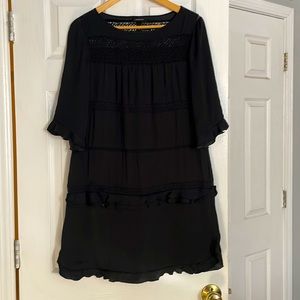 Who what were black sheath dress size M.